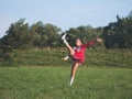 Teen Majorette Girl Twirling Baton Outdoors Royalty Free Stock Photo