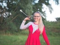 Teen Majorette Girl Twirling Baton Outdoors Royalty Free Stock Photo