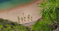 Best beach in the world. View of the coastline in Tenerife. Ocean waves crashing on the white sand beach. Unrecognizable