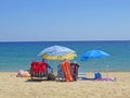 Best beaches of Pelion peninsula. Bright colored umbrellas. Pagasetic gulf. Greece.