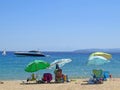 Best beaches of Pelion peninsula. Bright colored umbrellas. Pagasetic gulf. Greece.