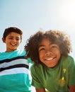 The best bud a dude could ask for. Portrait of two happy young friends hanging out together on a bright day outside. Royalty Free Stock Photo