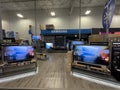 Best Buy retail electronics store interior Samsung smart TV area