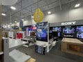 Best Buy retail electronics store interior Sony TV area