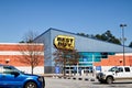 Best Buy retail store parking lot and building clear blue sky