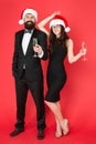 Best champagne for New Year Eve. Couple in love party with santa look. Happy family celebrate new year and Christmas Royalty Free Stock Photo