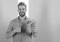 Best choice. Man ready for date bring pink flowers. Boyfriend smiling holds bouquet waiting for date. Guy bring romantic Royalty Free Stock Photo