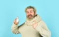 Best cold remedy. helpful nasal spray. man use nasal drops during course of disease. happy man says no to flu Royalty Free Stock Photo