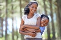 This is the best day out. Portrait of a mother and son embracing while enjoying a day outdoors. Royalty Free Stock Photo