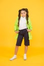 Best deals this fall. autumn kid fashion. dry comfortable in rainy weather. small girl raincoat. active schoolgirl Royalty Free Stock Photo