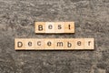 best december word written on wood block. best december text on table, concept