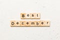 best december word written on wood block. best december text on table, concept