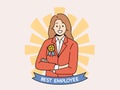 Best employee woman stands with arms crossed in front of chest with medal for career achievements