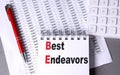BEST ENDEAVORS text on notebook with chart , pen and calculator Royalty Free Stock Photo