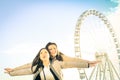 Best female friends enjoying time together outdoors at luna park Royalty Free Stock Photo