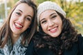 Best friend girls smiling to camera