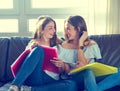 Best friend girls studying homework at home Royalty Free Stock Photo