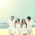 Best friend in white having fun laughing together at the beach