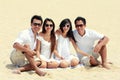 Best friend in white having fun laughing together at the beach