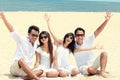 Best friend in white having fun laughing together at the beach