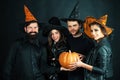 Best friends celebrated Halloween. Halloween poster or greeting card - people concept. Halloween Party group.