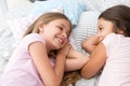 Best friends forever. Girls relaxing on bed. Slumber party concept. Girls just want to have fun. Invite friend for