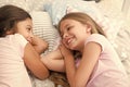 Best friends forever. Girls relaxing on bed. Slumber party concept. Girls just want to have fun. Invite friend for Royalty Free Stock Photo