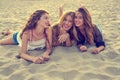 Best friends girls at sunset beach sand Royalty Free Stock Photo