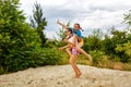 Best friends have fun at the beach. Piggyback Royalty Free Stock Photo