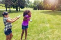 Best friends having fun with balloons. adorable little girls playing with water balloons outdoors. Royalty Free Stock Photo