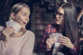 Best friends playing game card and looking each other. Royalty Free Stock Photo
