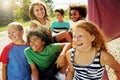 The best fun happens a the park. a group of diverse and happy kids hanging out together outside. Royalty Free Stock Photo