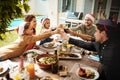 The best gift around the Christmas tree is family. a family making a toast on Christmas day. Royalty Free Stock Photo