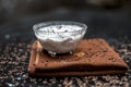 Best home remedy for constipation i.e. Raw yogurt with some cumin or cumin powder in it.All the ingredients on wooden surface. Royalty Free Stock Photo