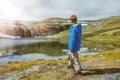Best Norway hike. Cute boy with hiking equipment in the mountains
