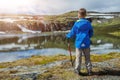 Best Norway hike. Cute boy with hiking equipment in the mountains