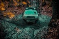 Best Off Road Vehicles. Mud and water splash in off-road racing. Drag racing car burns rubber. Extreme. Off-road car Royalty Free Stock Photo