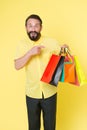 Best outfit ever. brutal caucasian hipster with moustache. Bearded man with shopping bags. Happy holidays. big sale in Royalty Free Stock Photo