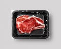 Black Food packaging with bacon grill stick top view