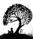 Best place to read concept, boy reading under the big tree, park scene in black and white, childhood memories, shadow