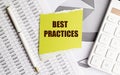 BEST PRACTICES text on torn paper on chart background Royalty Free Stock Photo