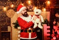 The best present. winter holidays. wait for xmas presents. happy bearded man with bear. new year gifts. christmas Royalty Free Stock Photo