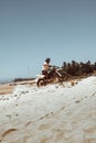 biker climbing the dune of paracuru