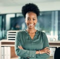 The best is yet to come. Portrait of a confident young businesswoman standing in an office. Royalty Free Stock Photo