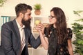 Best vitamin snack. Bearded man and sexy woman taking snack break in office. Sensual secretary and boss holding healthy Royalty Free Stock Photo