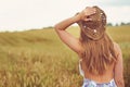 The best way to explore is by foot. Rearview shot of a young woman spending time in the countryside. Royalty Free Stock Photo