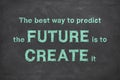 The best way to predict the future is to create it on rough black background stock photo JPG file Royalty Free Stock Photo
