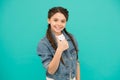 The best you can be. Happy girl give thumbs up blue background. Little child smile gesturing thumbs up. Approval gesture