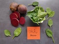 Betaine (TMG, trimethylglycine). Chemical formula of betaine with spinach and beets as natural sources of betaine Royalty Free Stock Photo