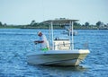 Bethany Beach, Delaware, U.S - August 1, 2020 - A man reeling a big fish on the boat near Indian River Inlet